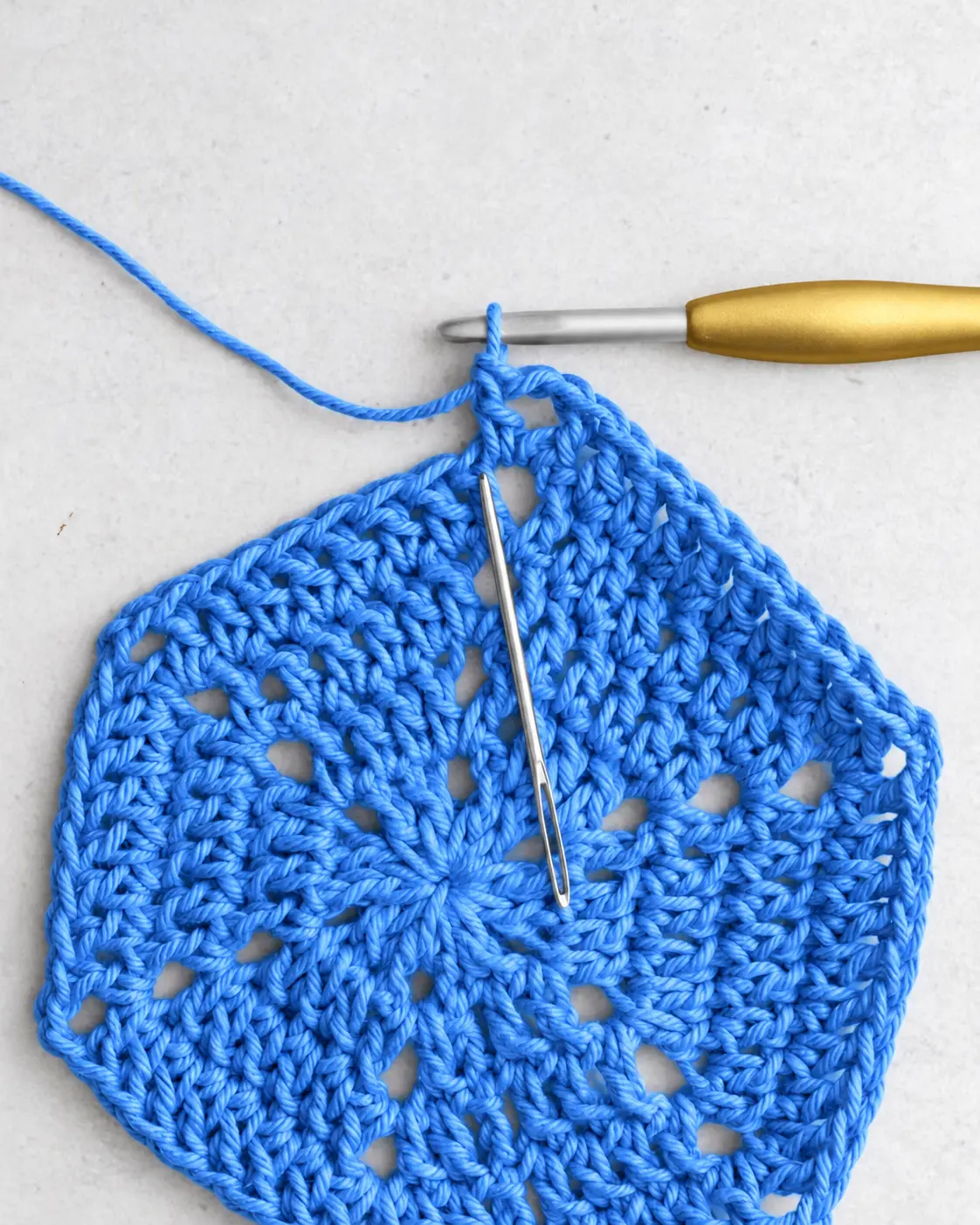 Don’t miss the first dc stitch after the corner stitches.